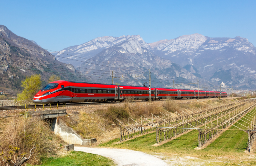 Frecciarossa FS ETR 1000 high speed train of Trenitalia on Brenner Railway near Avio in Italy